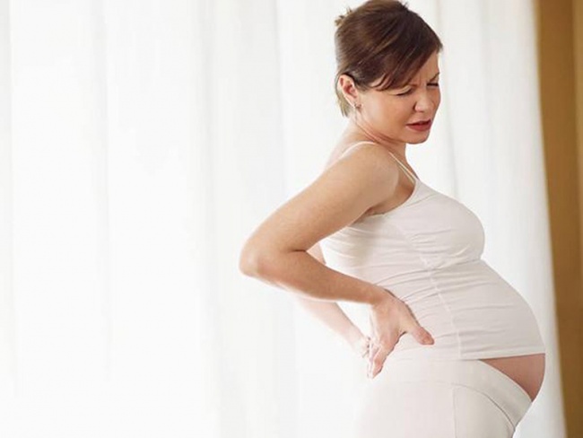 terhesség derékfájás első trimeszter